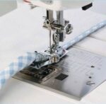 Stopka lamownik do wszywania lamówki zaprasowanej i niezaprasowanej JANOME  200313005 chwytacz rotacyjny