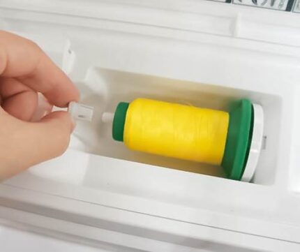 Blokada szpulki nici górnej 202233006 Janome